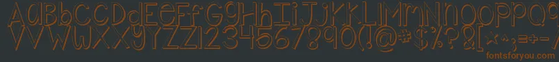 Шрифт Kgshakeitoffpopped – коричневые шрифты на чёрном фоне