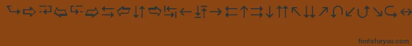 フォントWingdings3 – 黒い文字が茶色の背景にあります