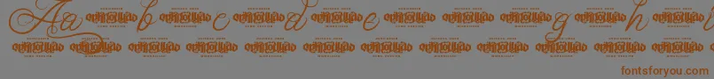 UnblessedScriptDemo Font – Brown Fonts on Gray Background