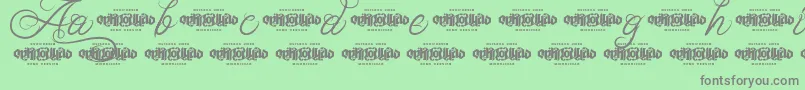 UnblessedScriptDemo-Schriftart – Graue Schriften auf grünem Hintergrund