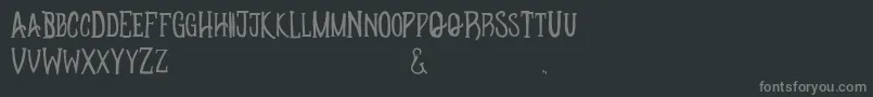 Apotheque-Schriftart – Graue Schriften auf schwarzem Hintergrund