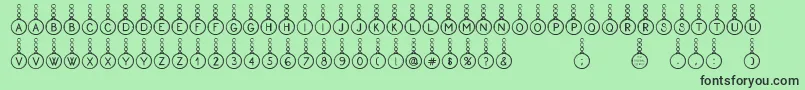 フォントProxanys – 緑の背景に黒い文字
