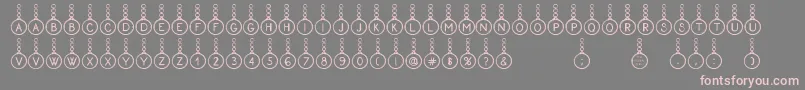 Proxanys-Schriftart – Rosa Schriften auf grauem Hintergrund