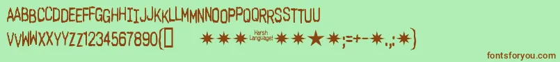 フォントHarsh Language Ac – 緑の背景に茶色のフォント