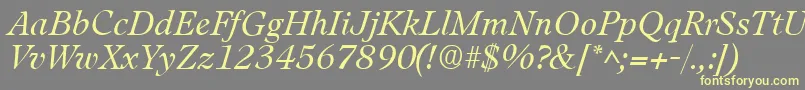 LeamingtonItalic-Schriftart – Gelbe Schriften auf grauem Hintergrund