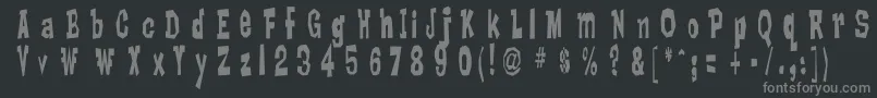 フォントLankyBastard – 黒い背景に灰色の文字