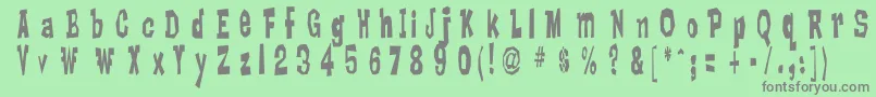 フォントLankyBastard – 緑の背景に灰色の文字