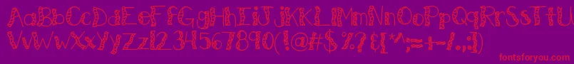 Czcionka Kbwitchinghour – czerwone czcionki na fioletowym tle