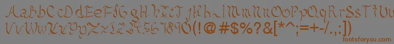 フォントKelliciahandwriting – 茶色の文字が灰色の背景にあります。