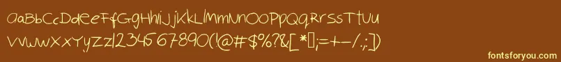 Robinscript-fontti – keltaiset fontit ruskealla taustalla