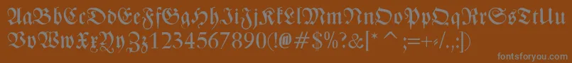 Weitere Informationen zur ZentenarFraktur-Schriftart ZentenarFraktur-Schriftart – Graue Schriften auf braunem Hintergrund
