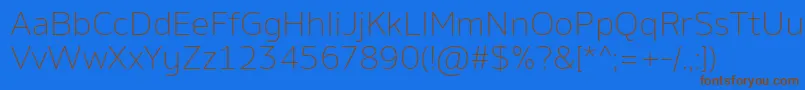 AminoExtralight Font – Brown Fonts on Blue Background