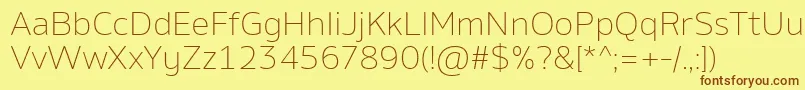 AminoExtralight Font – Brown Fonts on Yellow Background