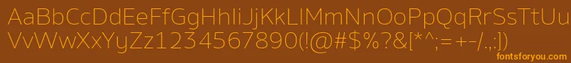 AminoExtralight Font – Orange Fonts on Brown Background