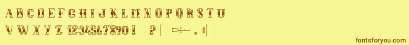 フォントLeBalDesCochons – 茶色の文字が黄色の背景にあります。