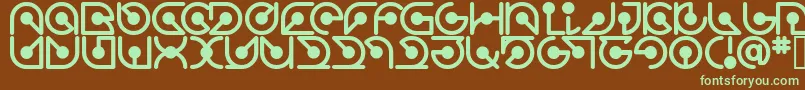 フォントAtomrg – 緑色の文字が茶色の背景にあります。