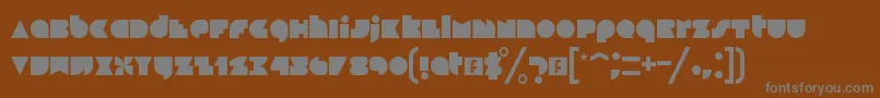 Blackfoot-fontti – harmaat kirjasimet ruskealla taustalla