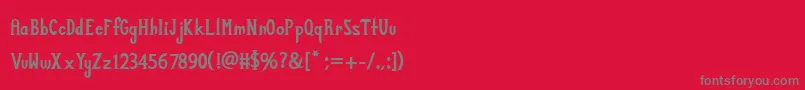 Zabdilus-fontti – harmaat kirjasimet punaisella taustalla