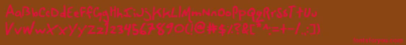 SpaceCowboy Font – Red Fonts on Brown Background