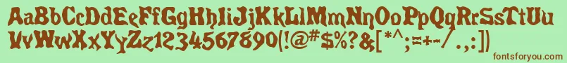 SpiritsMf Font – Brown Fonts on Green Background