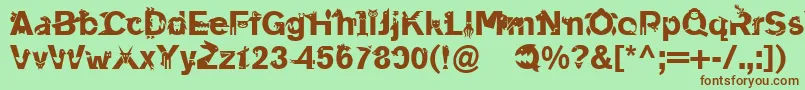 フォントLinotypeanimalia – 緑の背景に茶色のフォント