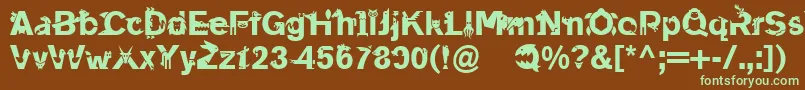 フォントLinotypeanimalia – 緑色の文字が茶色の背景にあります。
