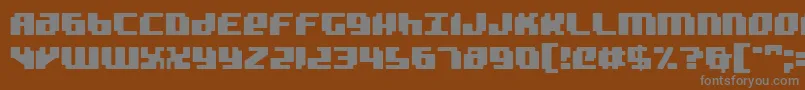Badrobot-fontti – harmaat kirjasimet ruskealla taustalla