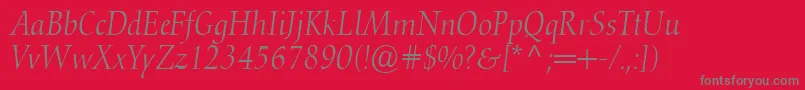 Czcionka ConquistaLightSsiLightItalic – szare czcionki na czerwonym tle