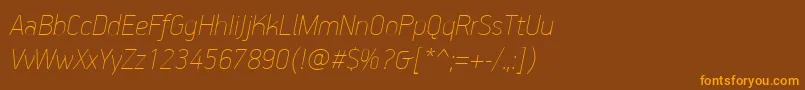 フォントPfhandbookproExtrathinitalic – オレンジ色の文字が茶色の背景にあります。