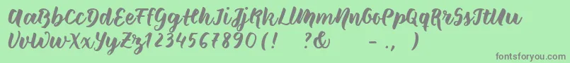 Wildcreaturessample Font – Gray Fonts on Green Background