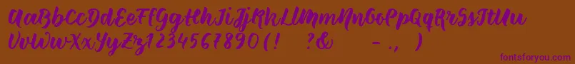 Шрифт Wildcreaturessample – фиолетовые шрифты на коричневом фоне