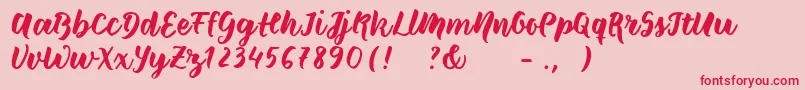 フォントWildcreaturessample – ピンクの背景に赤い文字
