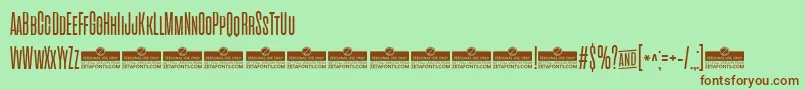 CinematograficaLightTrial Font – Brown Fonts on Green Background