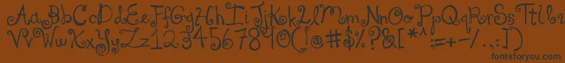 DjbYouMakeMeBlush-fontti – mustat fontit ruskealla taustalla
