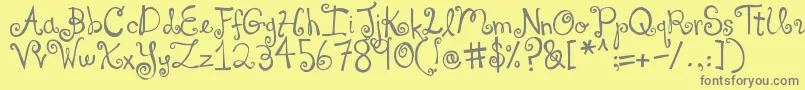 Fonte DjbYouMakeMeBlush – fontes cinzas em um fundo amarelo