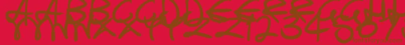 SwirlyCurlyInks Font – Brown Fonts on Red Background