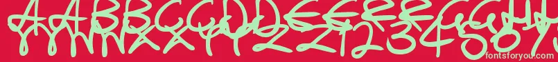 SwirlyCurlyInks Font – Green Fonts on Red Background