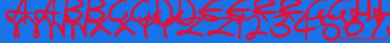 SwirlyCurlyInks Font – Red Fonts on Blue Background