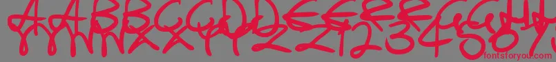 SwirlyCurlyInks Font – Red Fonts on Gray Background