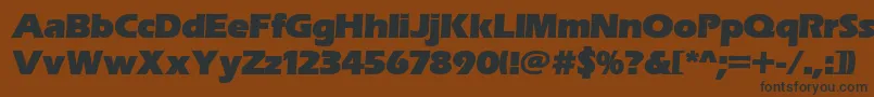 Erasitcpeeult-fontti – mustat fontit ruskealla taustalla