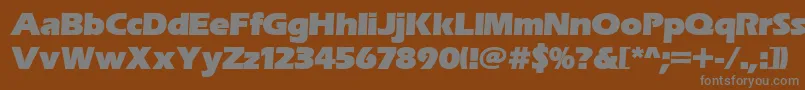 Erasitcpeeult-fontti – harmaat kirjasimet ruskealla taustalla