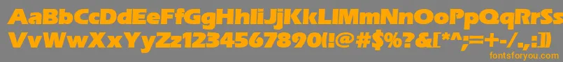 フォントErasitcpeeult – オレンジの文字は灰色の背景にあります。