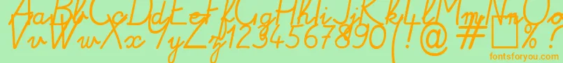 Alamain1 Font – Orange Fonts on Green Background