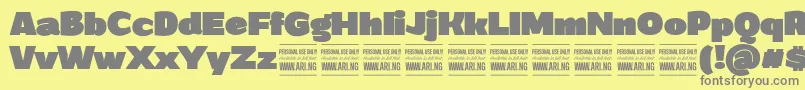 GrandiblackPersonalUse-fontti – harmaat kirjasimet keltaisella taustalla