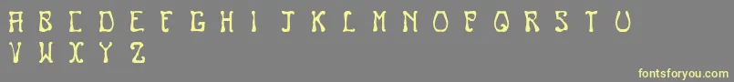 Nouveau Font – Yellow Fonts on Gray Background