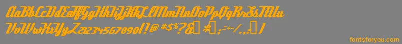 フォントDeftoneStylus – オレンジの文字は灰色の背景にあります。