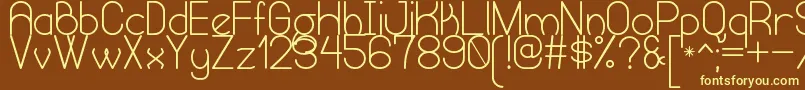 HumongousOfEternitySt-fontti – keltaiset fontit ruskealla taustalla