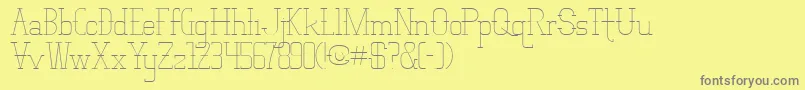 フォントVloderstone – 黄色の背景に灰色の文字
