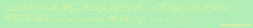 フォントQuillscriptsskBold – 黄色の文字が緑の背景にあります