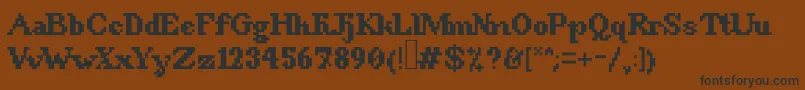 Czcionka 8BitSnobbery – czarne czcionki na brązowym tle